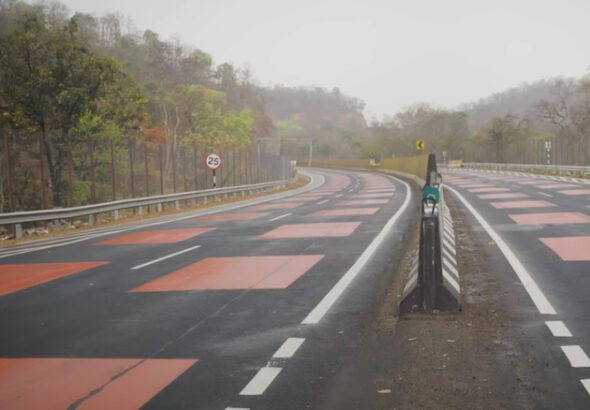 This 'Red Road' Is Designed To Slow Down Drivers And Protect Wild Life - 'red road'