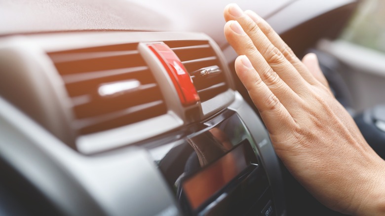 If Your Car's Air Conditioner Feels Weak, You Should Check Here First - your car's