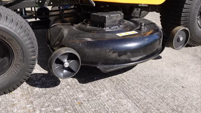 Should Mower Deck Wheels Touch The Ground? - mower deck