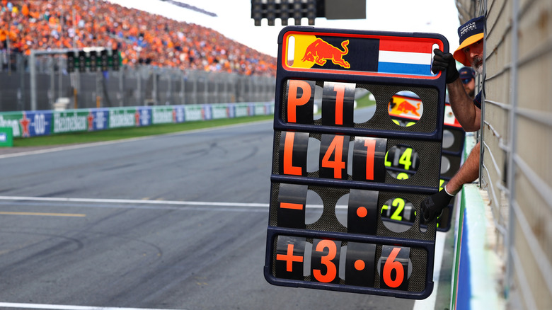 Why Do F1 Teams Still Rely On Old-School Pit Boards? - teams still